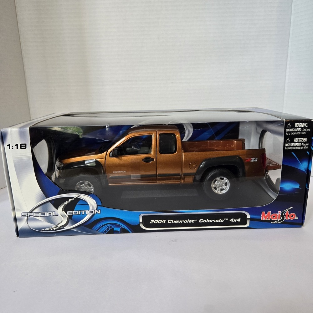2004 CHEVY COLORADO Z71‎ 4X4 NIB!! RARE FIND MAISTO 1:18 SPECIAL EDITION ORANGE